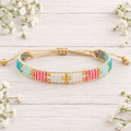 Pulsera Cruz Tejida Pastel